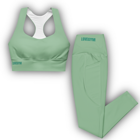 Green sports bra and leggings set with 'LOVEGYM' branding on a white background