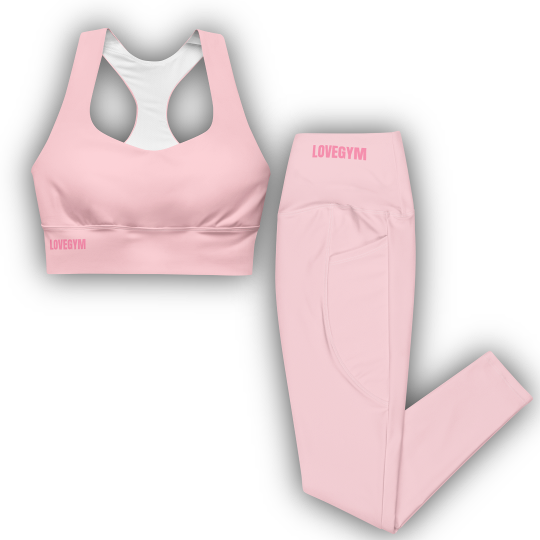 Pink sports bra and leggings set with 'LOVEGYM' branding on a white background