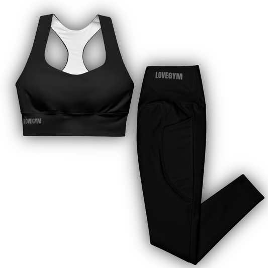 Black sports bra and leggings set with 'LOVEGYM' branding on a white background
