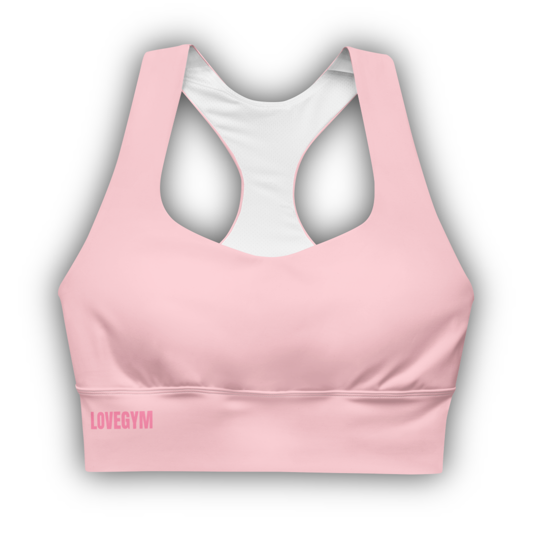Pink sports bra with 'LOVEGYM' logo on a white background