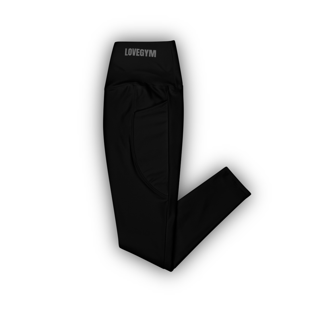 Black leggings with 'LOVEGYM' branding on a white background