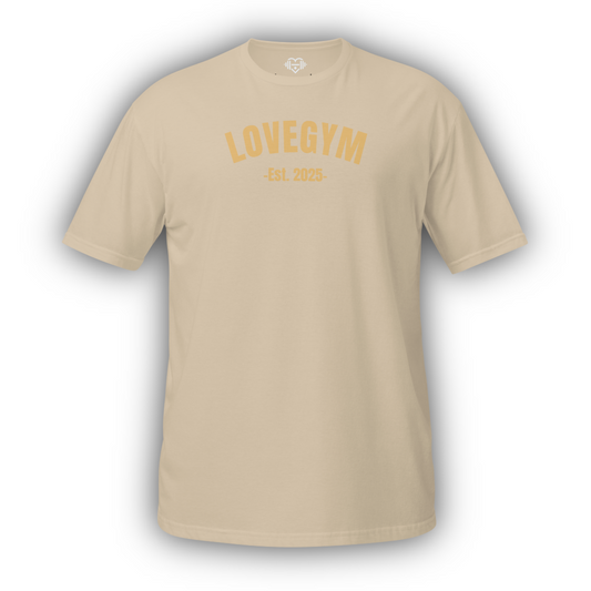 Beige t-shirt with 'LOVEGYM EST. 2025' text on a white background